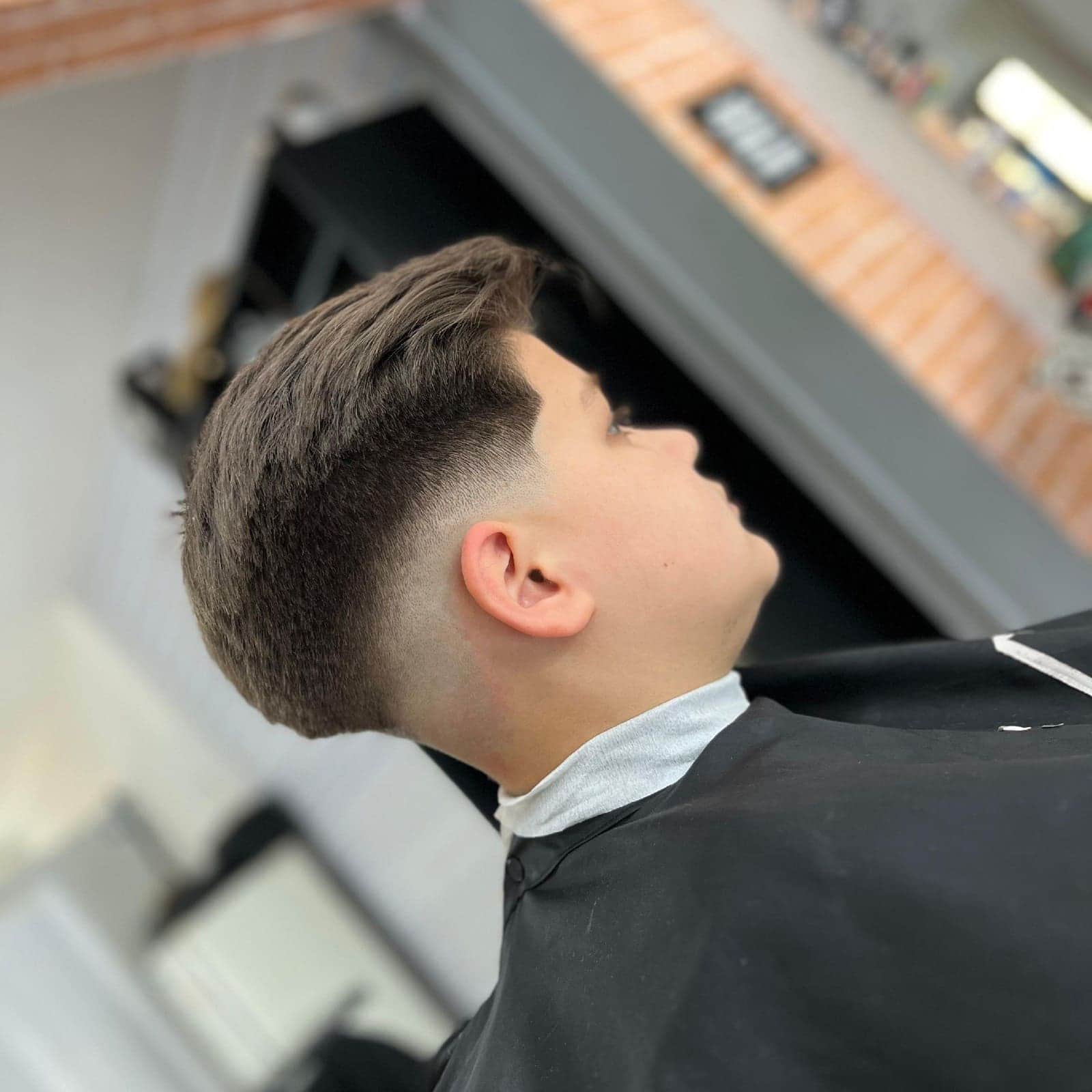 Corte masculino feito na Dom Elii Barbershop, em Curitiba